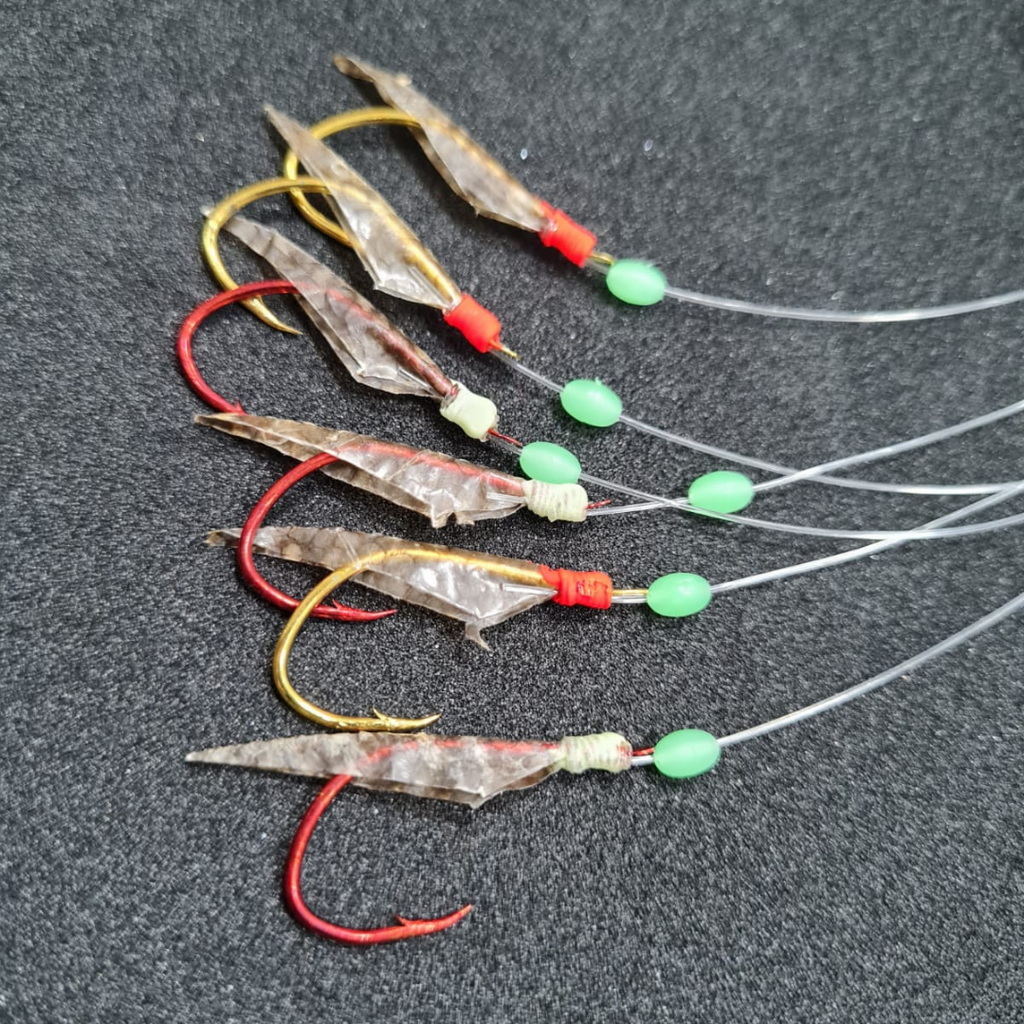 sedal pesca en el mar Sabiki 5 anzuelos con skirt de plástico iridiscente -  Pescamania